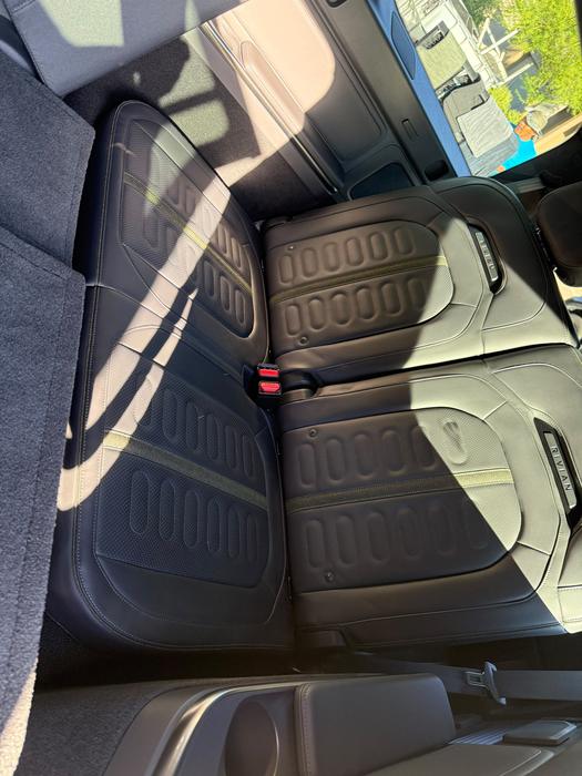 Rivian R1S all-weather floor mats cleaned and reinstalled