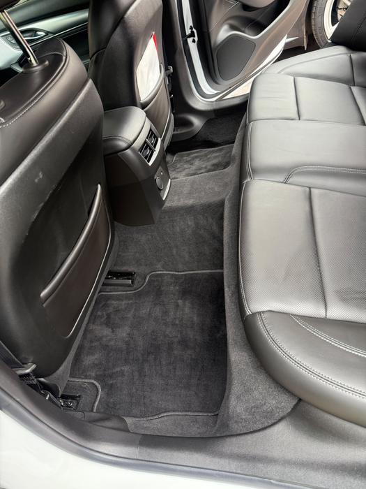 Cadillac CT5 rear footwell with freshly extracted carpet