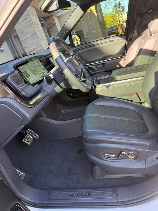 Rivian R1S front cabin shot from the rear seats after a full interior detail