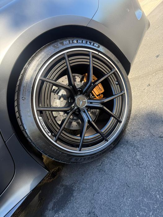 AMG GT front wheel and Michelin tire cleaned and dressed