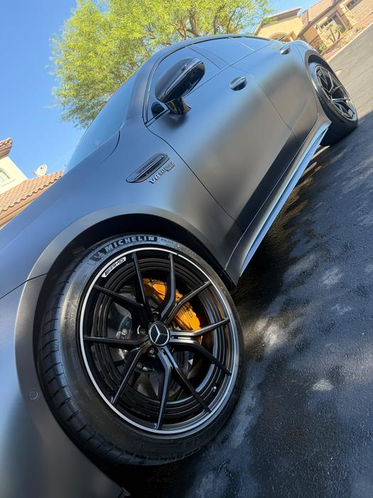Mercedes-AMG GT side profile with cleaned forged wheel and yellow calipers