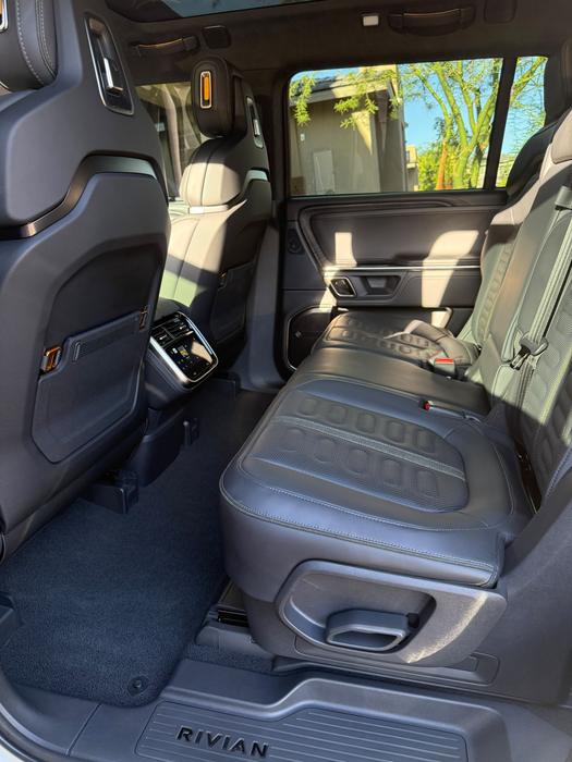 Rivian R1S rear cabin with cleaned seat backs and door cards