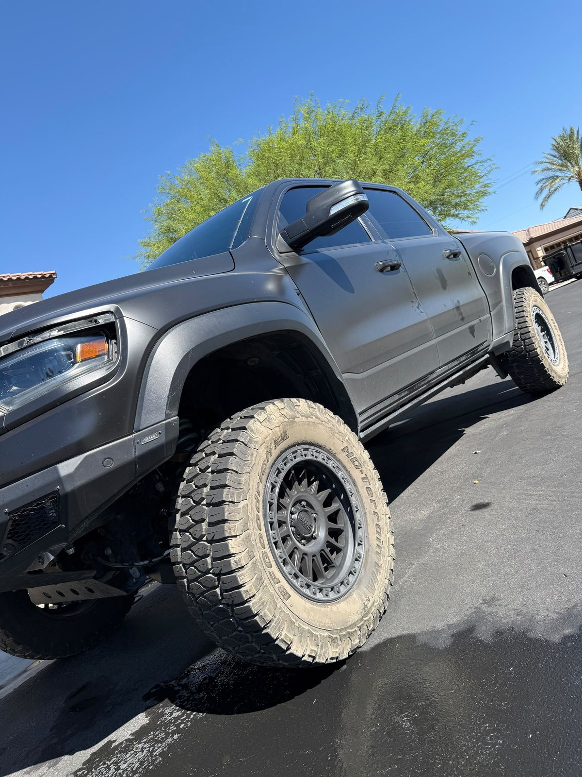 Lifted grey GMC Sierra full side profile washed and sealed in Las Vegas