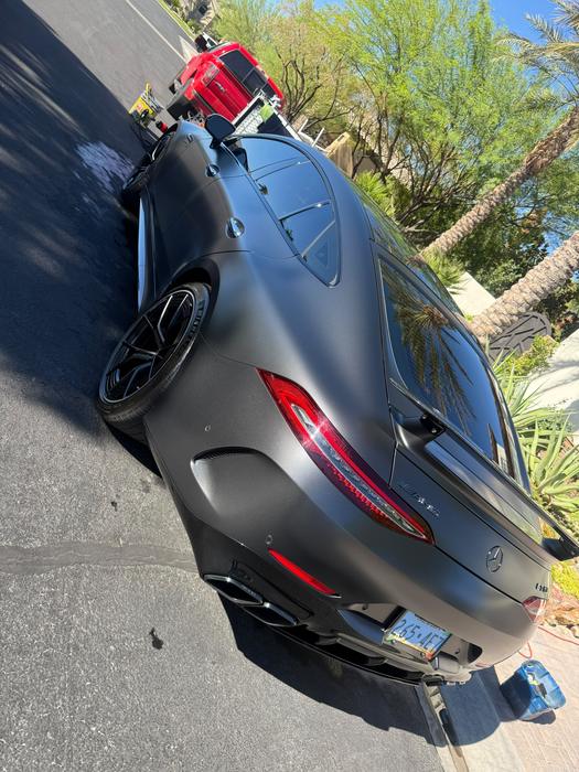 Matte grey Mercedes-AMG GT rear quarter after paint decontamination