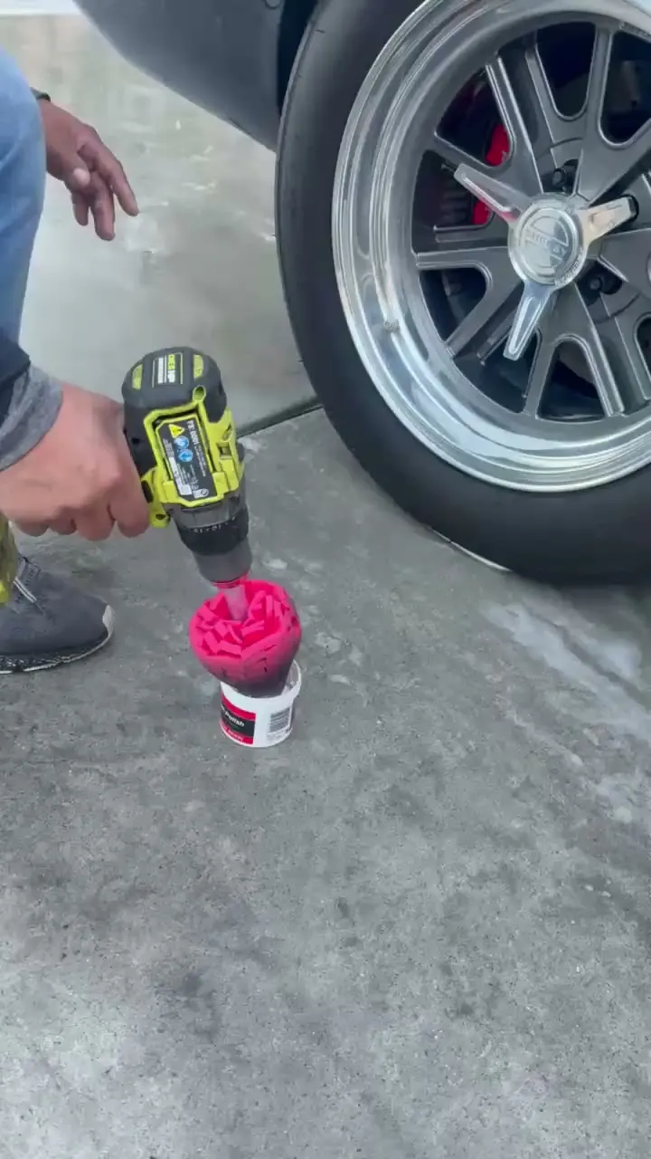 Drill brush scrubbing the face and spokes of a polished wheel